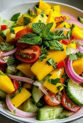 Erfrischender Mangosalat mit Limetten-Dressing genießen!