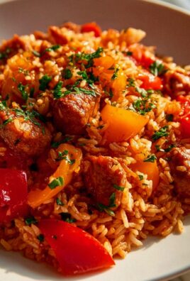 Rustikales Serbisches Reisfleisch mit Paprika und Tomaten